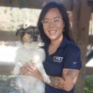 Eunah Preston holding a dog