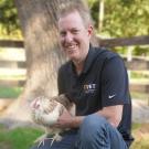 Jon Weststeyn holding a chicken